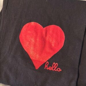 American Apparel black leggings with red hearts